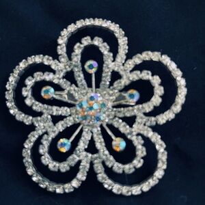 Brooche. Rhinestones. Excellent condition, 2 1/4”diameter. 2 for $25 promo